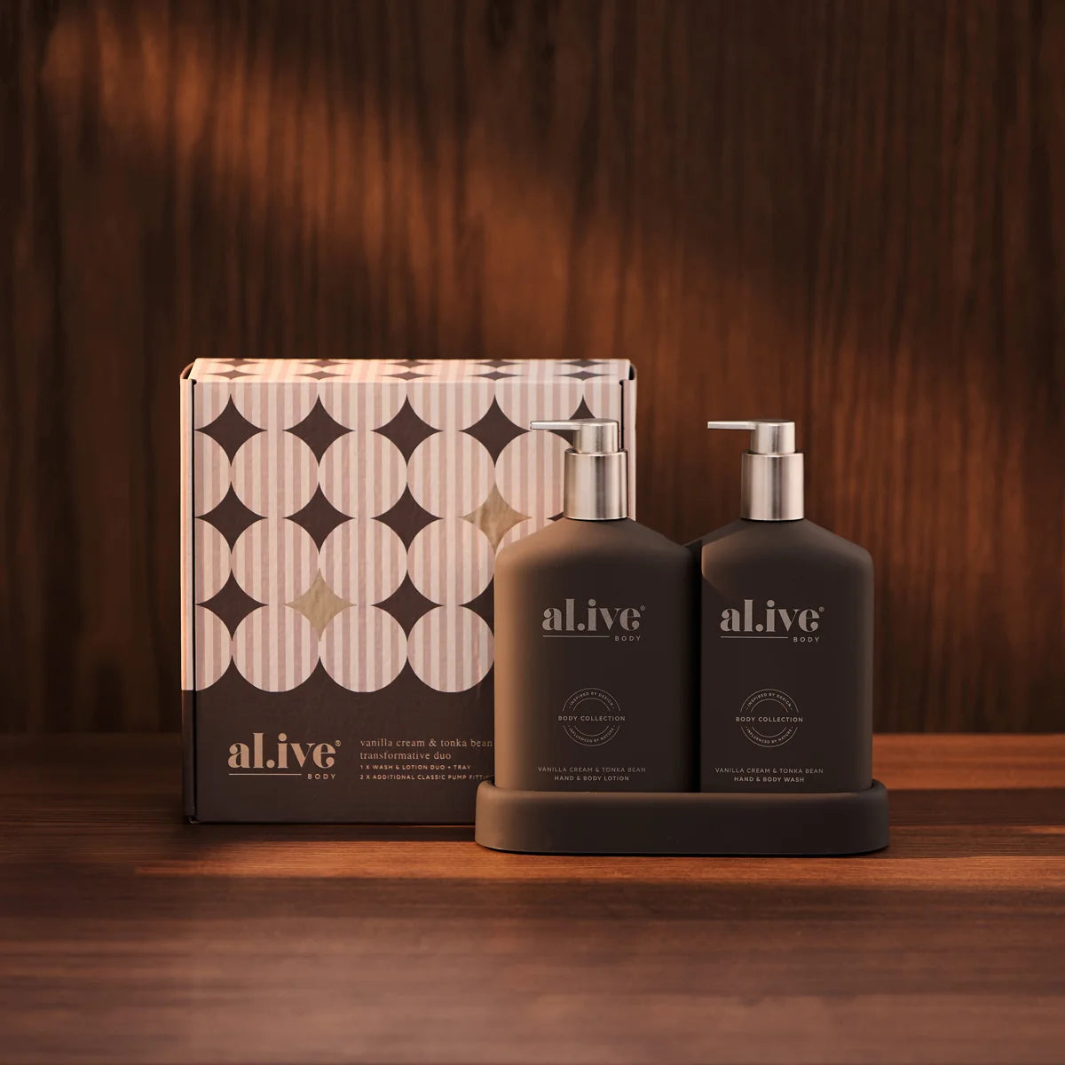 al.ive body Limited Edition Transformative Duo Vanilla Cream & Tonka Bean with gift box on a timber shelf