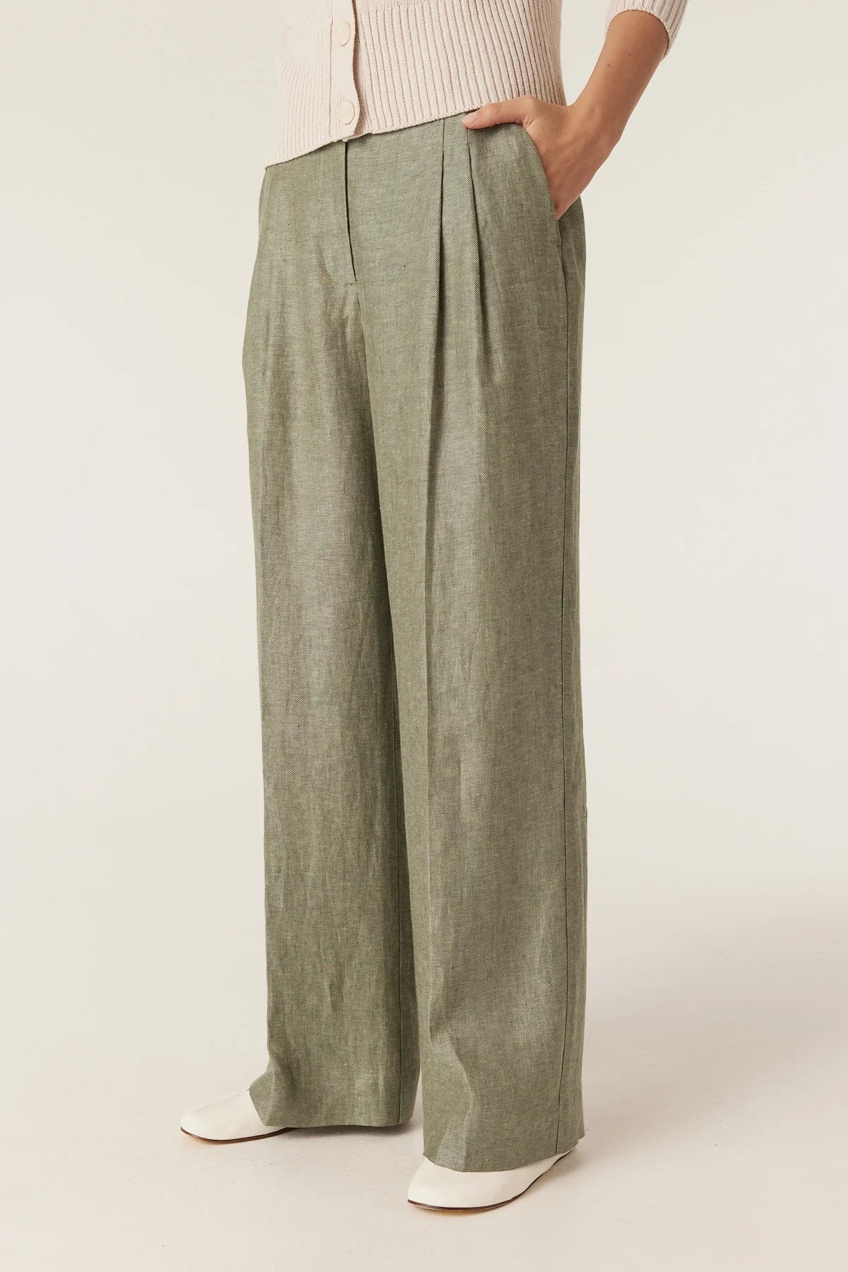Close-up of the wide leg and pleat detail on the Cable Melbourne Evelyn Linen Pant in Green
