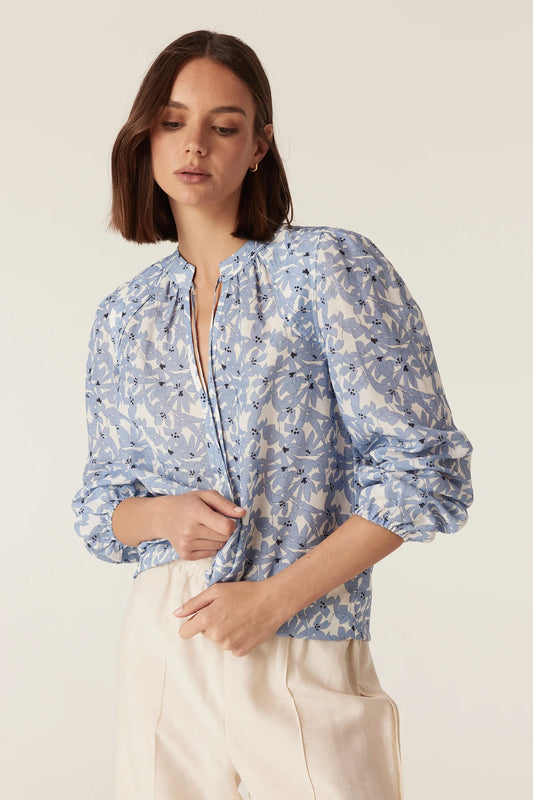 Close-up detail of the Cable Melbourne Juliette Blouse in Blue Flower print, worn