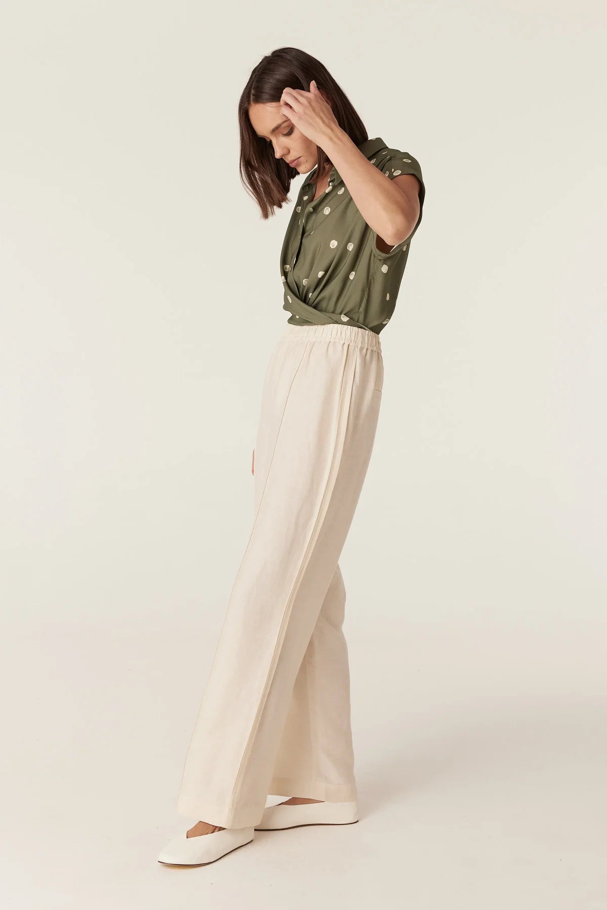 Cable Melbourne Muse Spring Blouse in Green Spot print, worn - side view