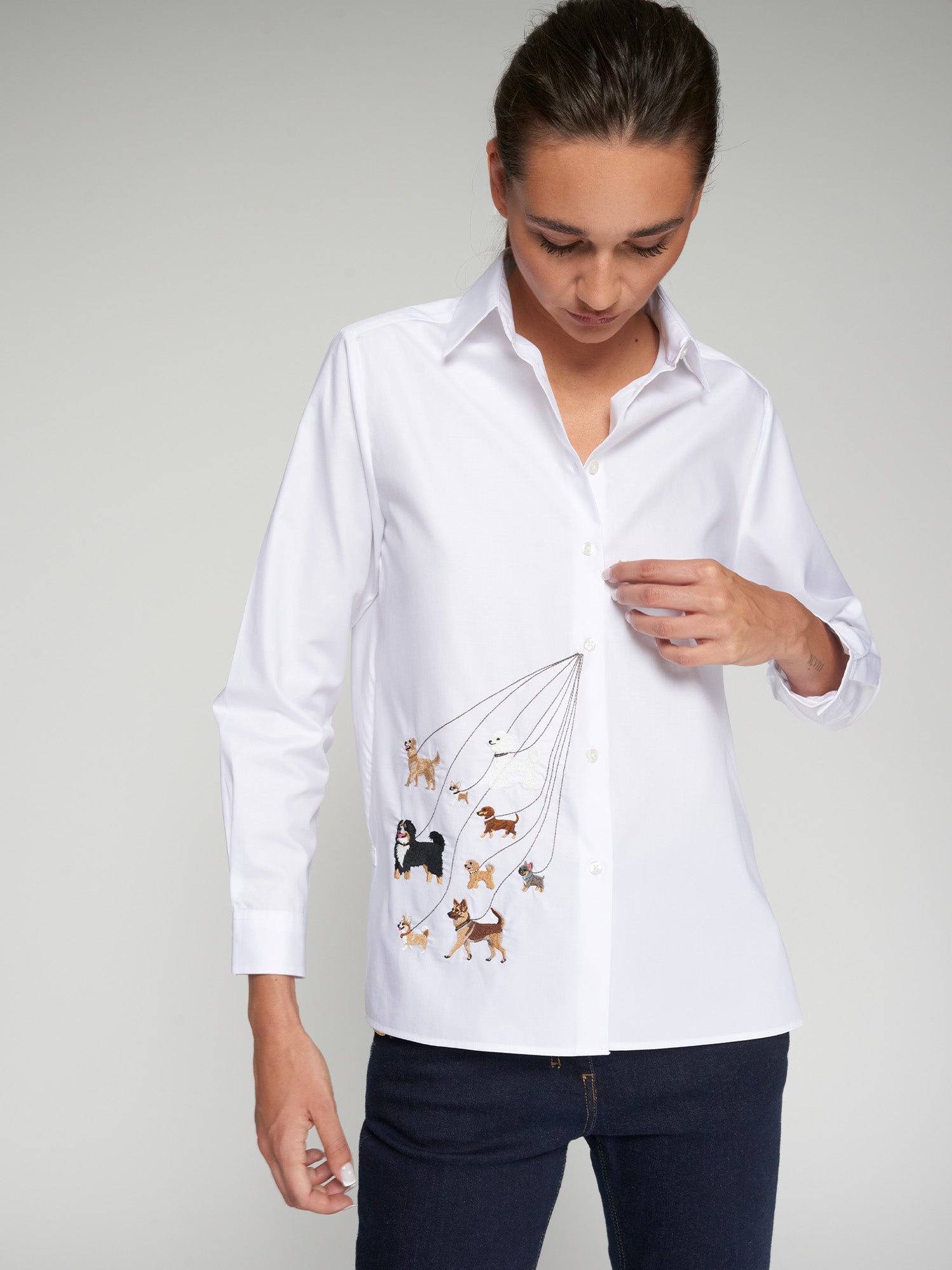 Vilagallo Tea White Embroidered Cotton Twill Shirt styled on model with dark denim, dog embroidery design