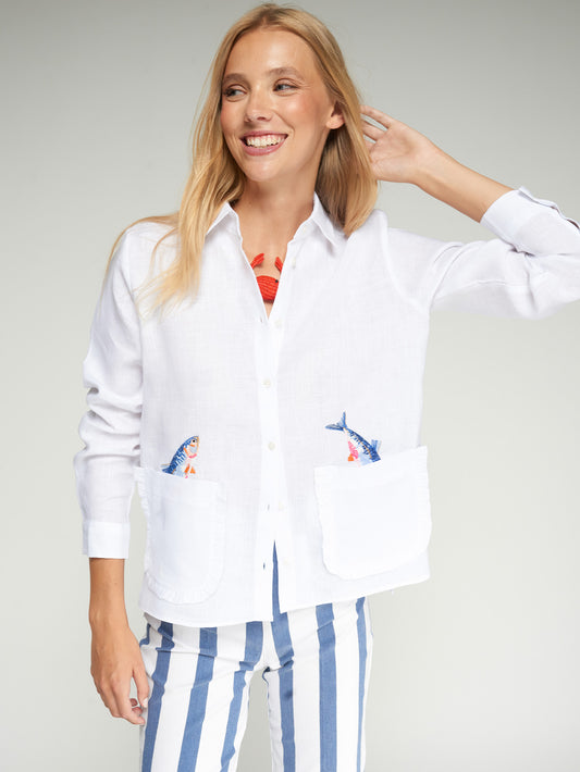 Vilagallo Embroidered Ruffle Pockets Linen Shirt in white worn by model with coral crab necklace