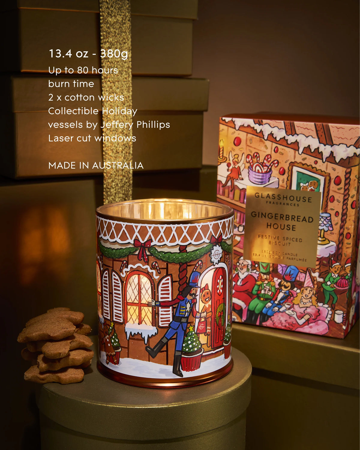 Glasshouse Fragrances Gingerbread House 380g Candle lit beside gingerbread biscuits, up to 80 hours burn time