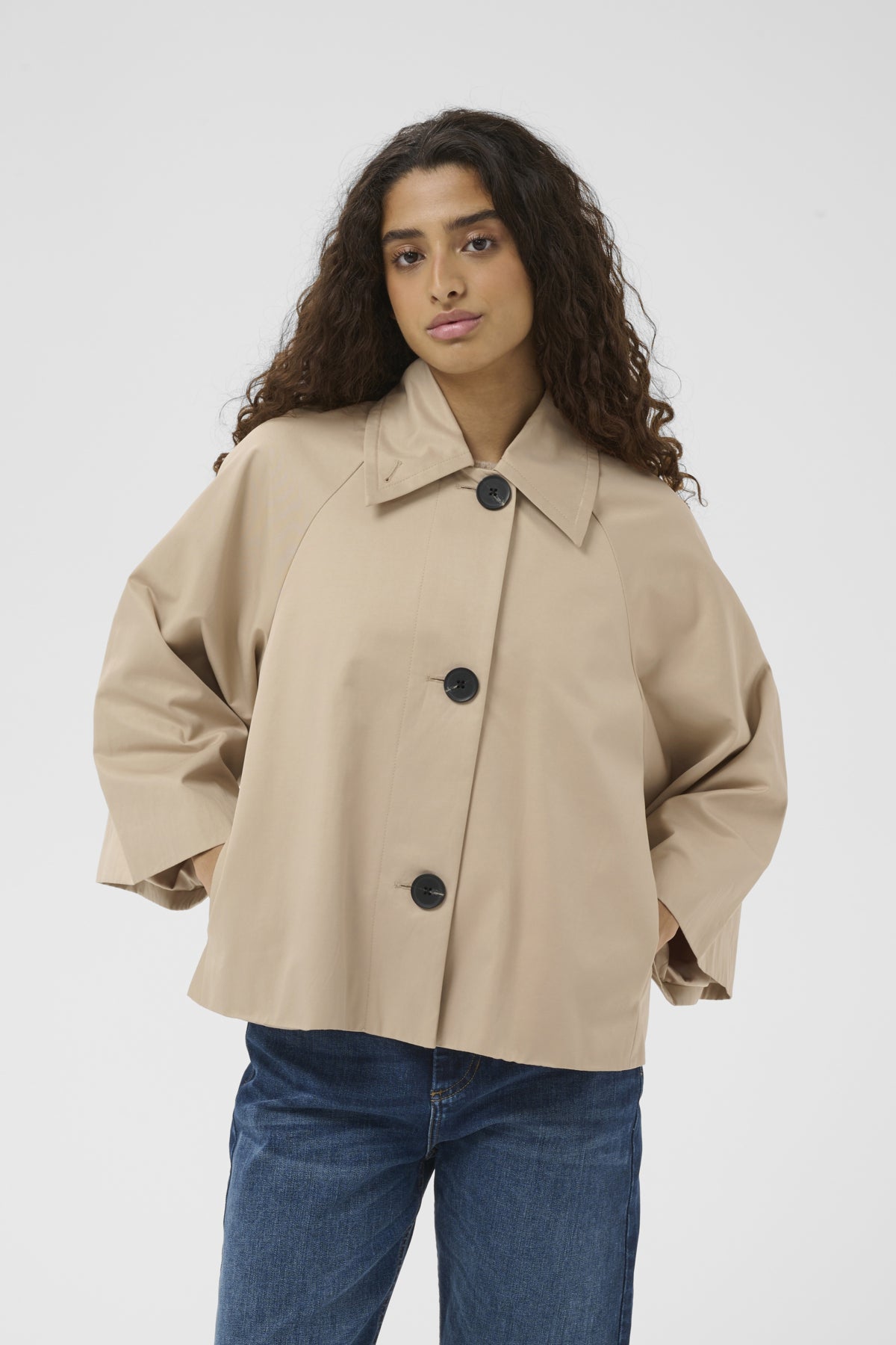 Haus of Alma InWear Hinonaiw Cape Jacket in Sandstone - cropped cape-back jacket with dolman sleeves, view 07