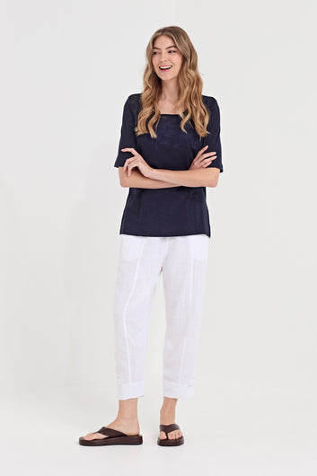 Verge Bounty Pant in White, worn - front