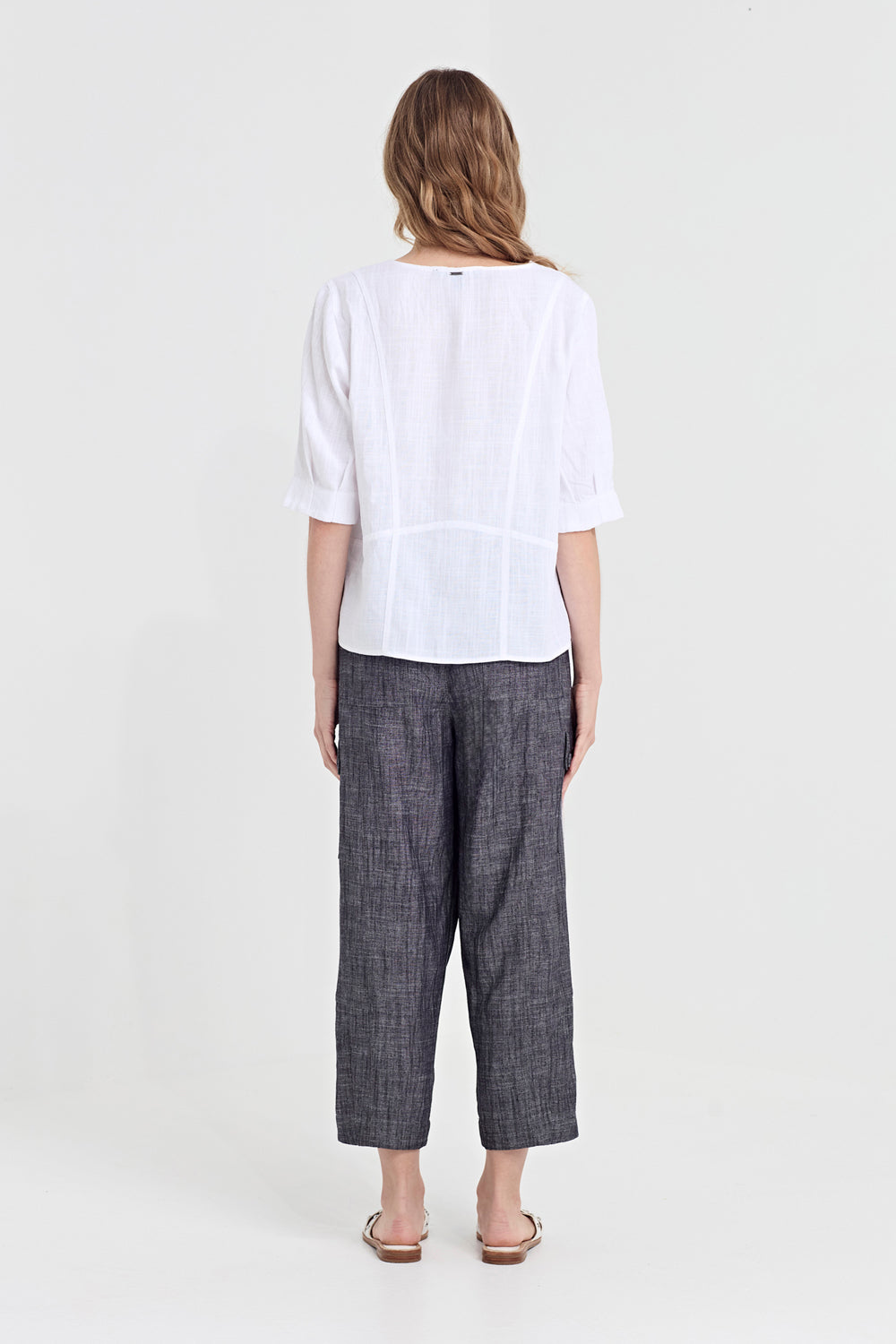 Verge Faithful Pant in Ink, worn - back