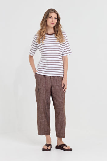 Verge Faithful Pant in Cocoa, worn - front